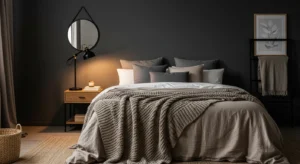 Charcoal walls creating a soft moody and cozy bedroom