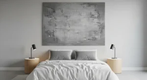 Grey wall art adding subtle detail to a bedroom