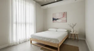 Low-profile bed making small room feel more spacious