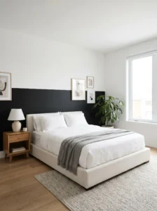 Half black painted accent wall bedroom with modern two-tone design