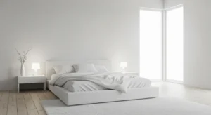 Minimal decor keeping a white bedroom clean and simple
