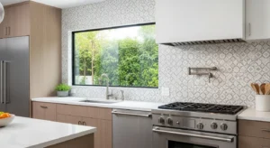 Patterned tiles adding interest to a white kitchen