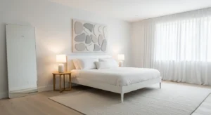 Wall art adding personality to a white bedroom