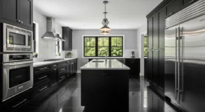 Black flooring creating a unified kitchen design