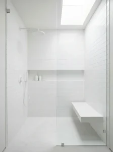 Minimalist all-white shower design with clean and modern look