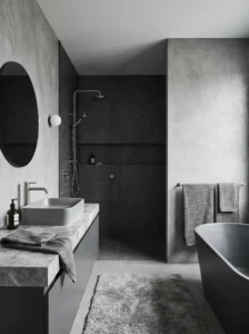 Monochrome grey bathroom with layered tones and modern design