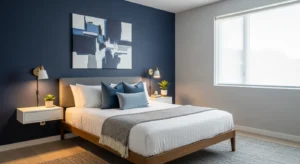 Navy accent wall adding depth to a calming blue bedroom
