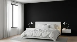 Black accent wall adding depth and elegance to a bedroom