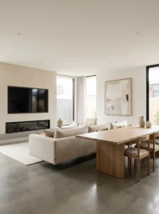 Floating sofa used as divider in living room dining room combo layout