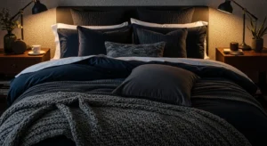 Dark bedding creating a cozy cocoon-like bedroom feel