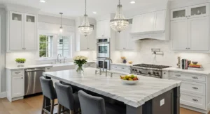 White kitchen with marble countertops adding elegance