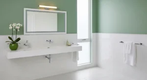 Green and white bathroom creating a fresh balanced look
