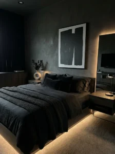 Monochrome black bedding in a modern men’s bedroom with clean and stylish look