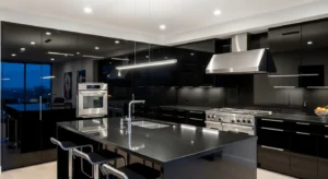 Glossy black cabinets creating a sleek modern kitchen