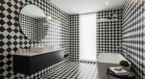 Patterned tiles adding interest to a black and white bathroom
