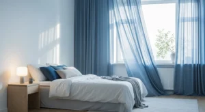 Blue curtains creating a soft and calming bedroom atmosphere