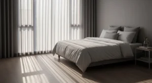 Grey curtains adding softness to a modern bedroom