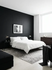 Black and white bedroom with bold contrast accent wall design