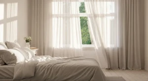 White curtains creating an airy and bright bedroom
