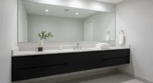 Black vanity creating a sleek focal point