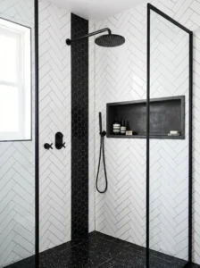 Modern shower with matte black fixtures and white tile contrast