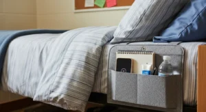 Bedside caddy keeping essentials within reach in a dorm room