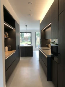 Floor-to-ceiling kitchen cabinets maximizing storage in a modern space