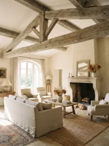 exposed wooden beams French country cozy living room