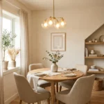 Small dining room ideas with round table, neutral decor, and cozy modern aesthetic