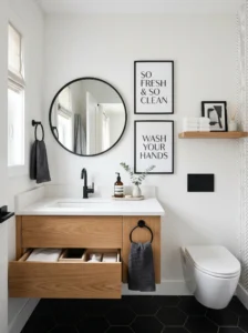 Modern powder room with minimalist framed typography wall art.
