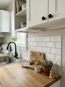 “Peel-and-stick backsplash upgrade in a rental kitchen”