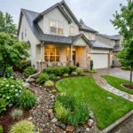 "Modern home with effective downspout drainage solutions protecting the foundation and landscaping from rainwater damage."