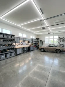 Well-lit garage featuring bright LED lighting and organized storage.