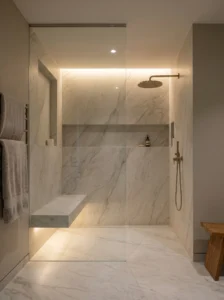 Modern shower with large-format porcelain tiles and clean seamless walls.