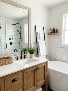 Farmhouse bathroom featuring matte black fixtures and white tile.