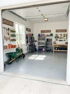 Garage organized into separate storage zones for different categories of items.