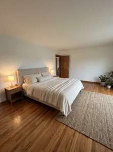 Master bedroom with the bed positioned to provide a clear view of the bedroom door